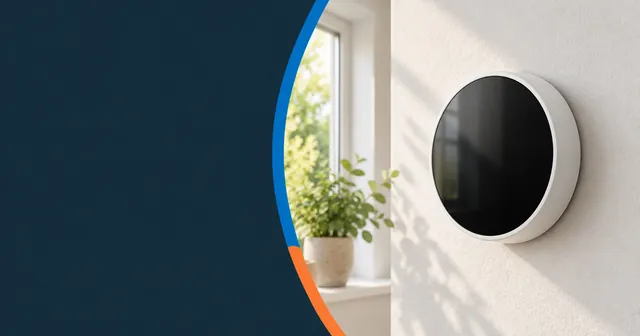 A smart room thermostat fitted on a wall