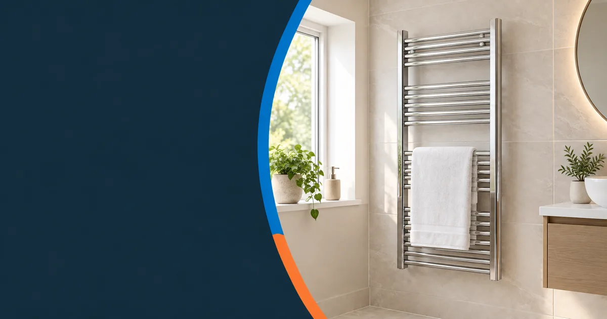 A chrome heated towel rail in a bright bathroom